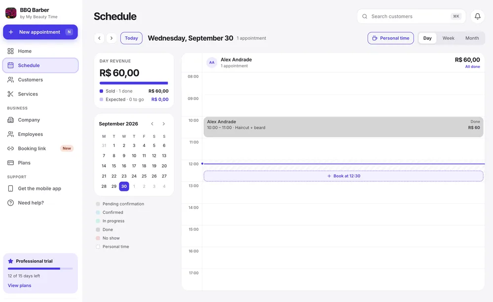 Agenda na versão web, com calendário do mês, faturamento do dia e a grade de horários do profissional.